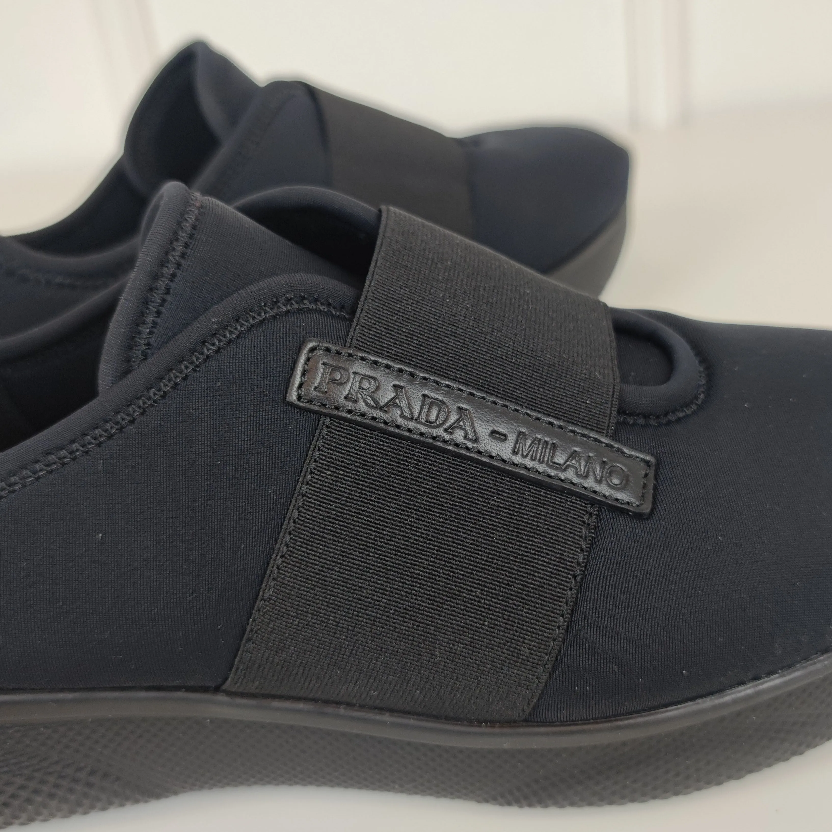 Sneakers Prada nere neoprene